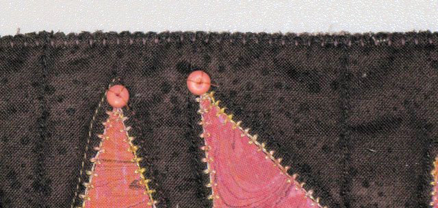 blanket-stitch-with-brown-thread-306x640