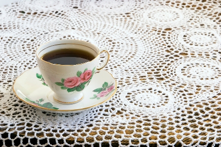 Vintage Teacup on Crochet Tablecloth